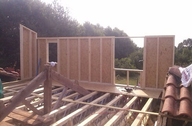 Travaux de construction de maison en bois